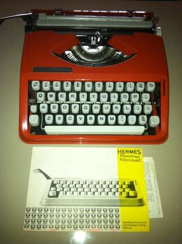 Hermes Baby Orange Typewriter 70s Script Font