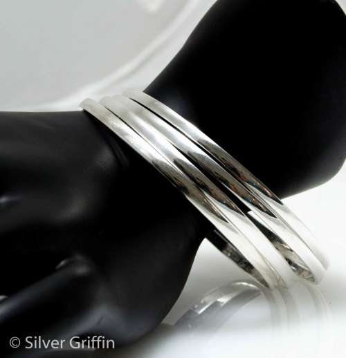 99.9 PURE SOLID SILVER HAND CRAFTED ELEGANT BANGLES EACH BANGLE IS 10g