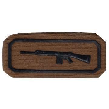 S.A.D.F SMALL ARMS COMPETION (MARKSMAN) NUTRIA- EMBOSSED PROFICIENCY BREAST BADGE WITH PINS.