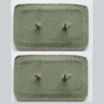 S.A.D.F LANCE CORPORAL EMBOSSED RANK/BADGE INSIGNIA WITH PINS.