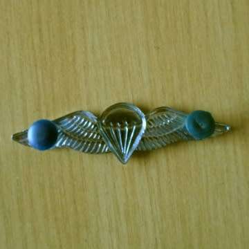 S.A Parachute Dispatcher Or 50 Jumps Or More Full Size Wing With Pins In Place.