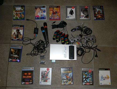 Silver PS2 Bundle incl Singstar and Buzz Controllers