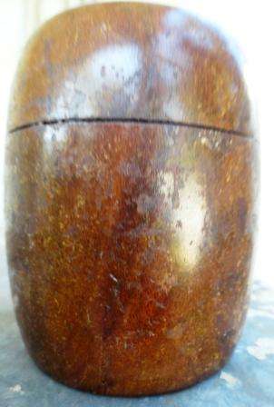 A vintage South African stinkwood cigarette container