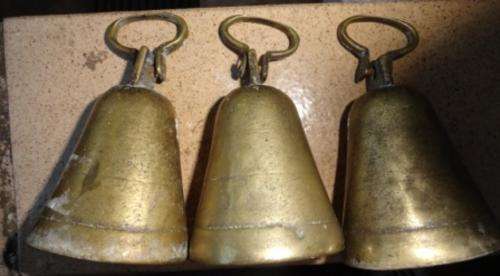 A set of three vintage brass bells ( cow? sheep? religious?)