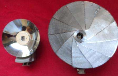 Two vintage flash guns in their cases-one in its leather pouch.