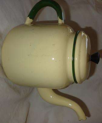 A cream  enamel  kettle ,