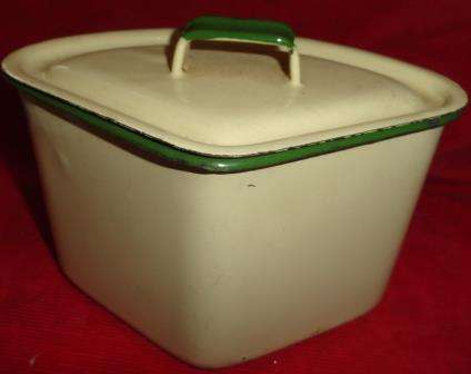 An enamel triangular pot.