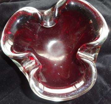 A ruby red MURANO ashtray