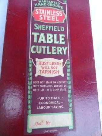 A BOXED set of vintage BONE HANDLE SHEFFIELD TABLE CUTLERY (KNIVES) -unused