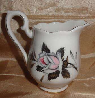 An exquisite ROYAL ALBERT  creamer