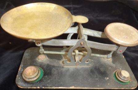 A vntage  jeweller's scale with weights