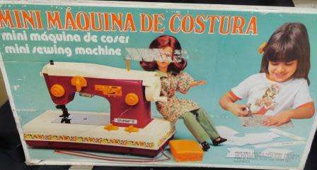 A boxed  childs sewing machine  (not tested)