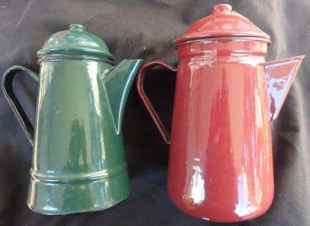 A pair of enamel coffee pots- green and red.
