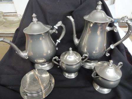 An electroplated tea and coffee set with coasters