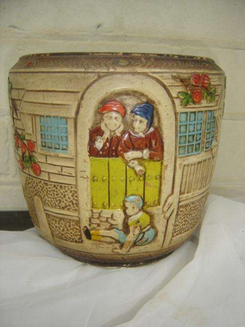 A small highly decorated vintage jardienere