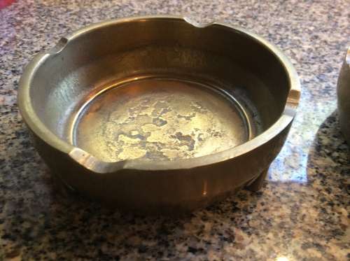 Pair of brass ashtrays.