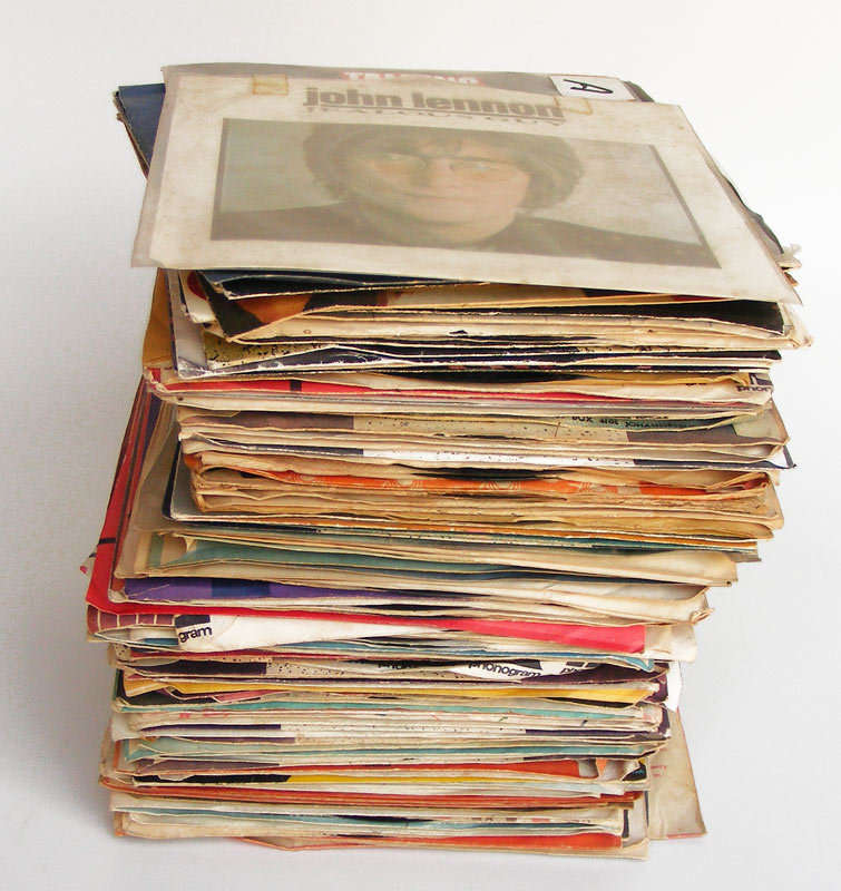 Large lot of 100 vintage 7 single records