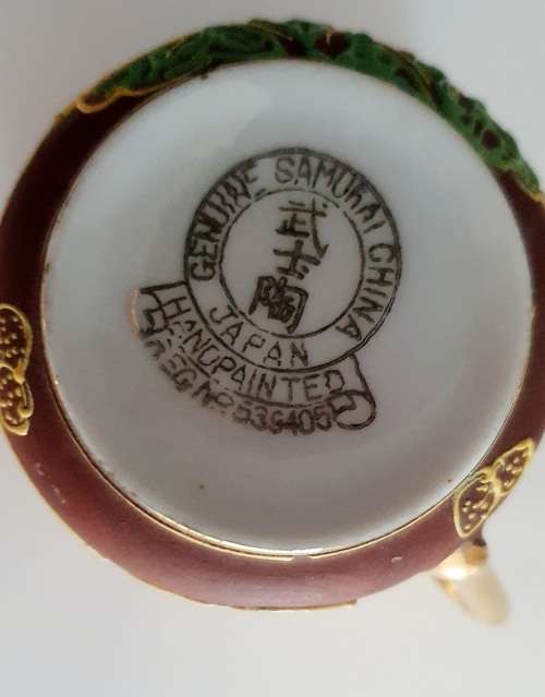 Handpainted Samurai tea cup and saucer duo Japan