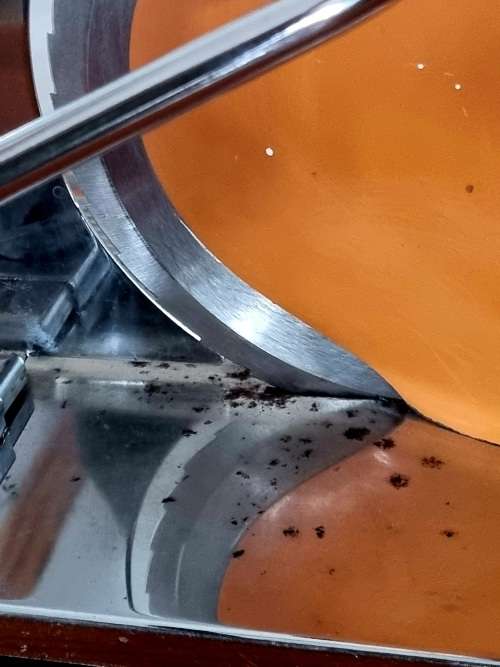 Orange enamel and steel retro bread slicer