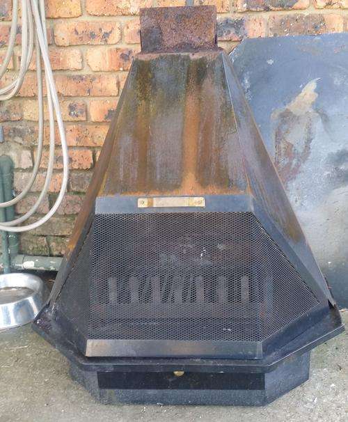 Freestanding Fireplace with rotating cowl and flue pipe