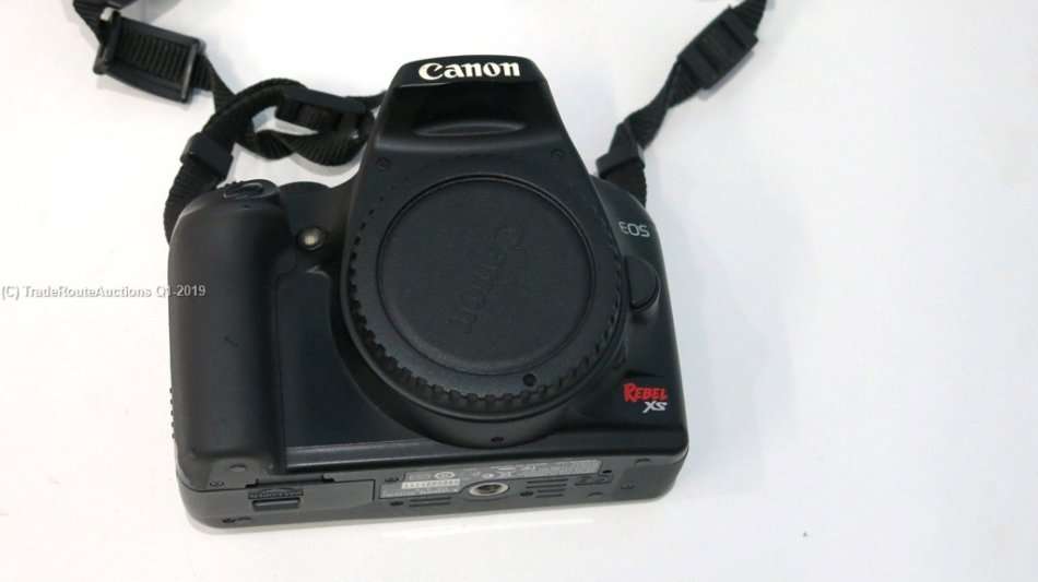 Canon EOS Rebel XS 10.1-Megapixel Digital SLR Camera - Black (Body Only)