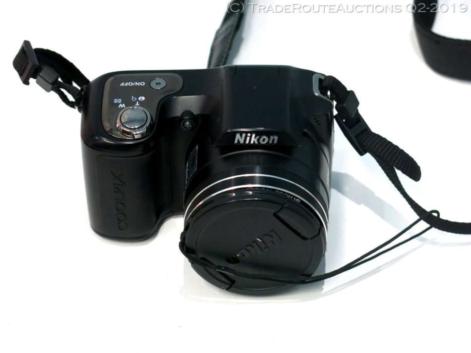 Nikon Coolpix L100 10 MP Digital Camera with 15x Optical Vibration Reduction (VR) Zoom