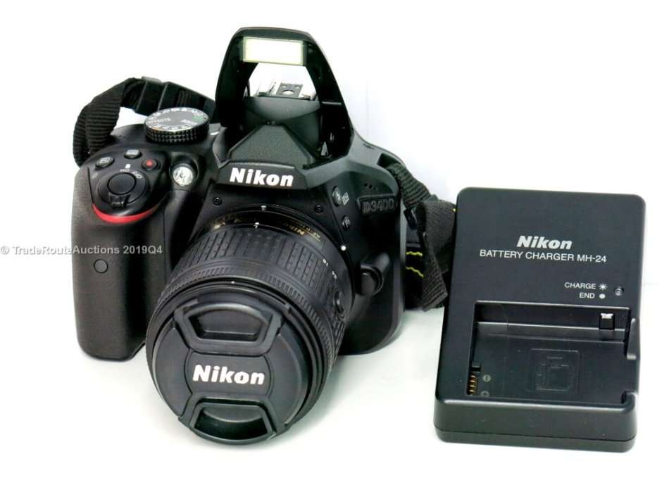 Nikon D3400 24.2 MP CMOS Digital SLR Camera body + Nikon AF-P 18-55 VR Lens Kit