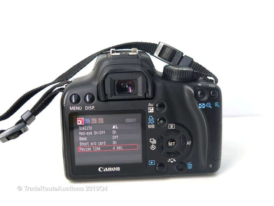 Canon EOS 1000D Digital SLR camera plus Canon 18-55mm Lens Professional KIT