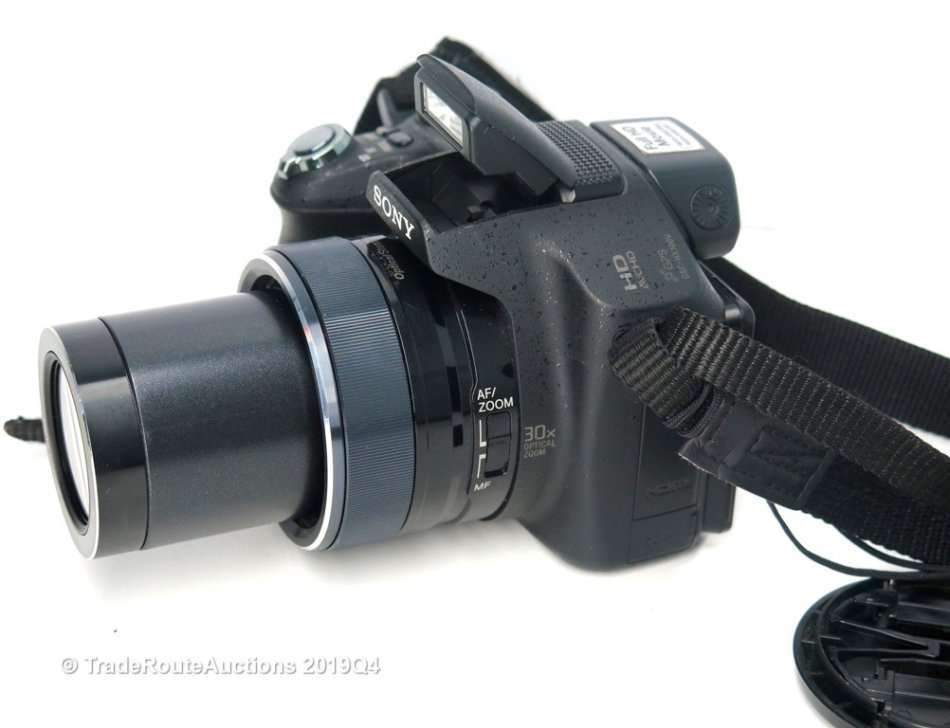 Sony Cyber-Shot DSC-HX100V 16.2 MP Exmor R CMOS Digital Still Camera Carl Zeiss Vario-Tessar Lens