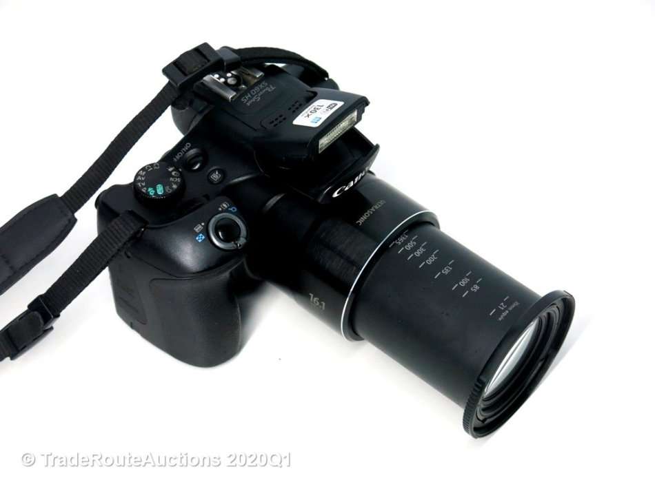 Canon Powershot SX60 HS 16.1MP Digital Camera 65x Optical Zoom Lens 3-inch LCD Tilt Screen (Black)