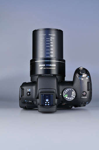 Canon PowerShot SX1IS 10 MP CMOS Digital Camera with 20x Wide Angle Optical Image Stabilized Zoom