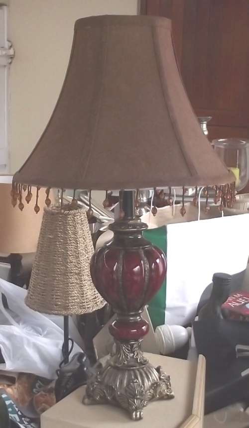 Red lamp with brown shade