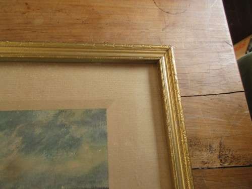 1947 PRINT OF A BEACH SCENE WITH HOUSES