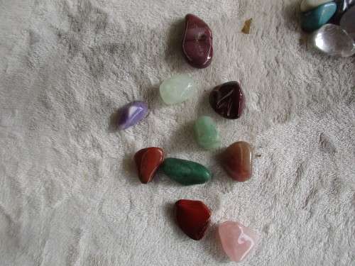 COLLECTION OF 30 POLISHED  BRIGHTLY COLOURED  SMALLISH STONES IDEAL FOR JEWELLERY