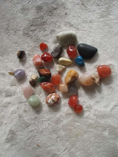 COLLECTION OF 39 POLISHED  BRIGHTLY COLOURED  SMALLISH STONES IDEAL FOR JEWELLERY