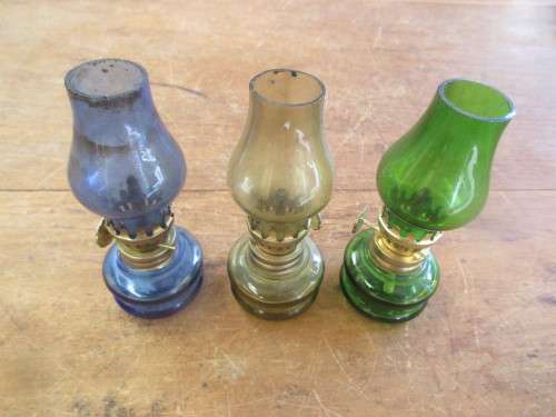 SET OF THREE OIL LAMPS , GREEN, BLUE AND  AMBER COLOUR.