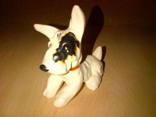 Lying dog with patch on eye - ornament