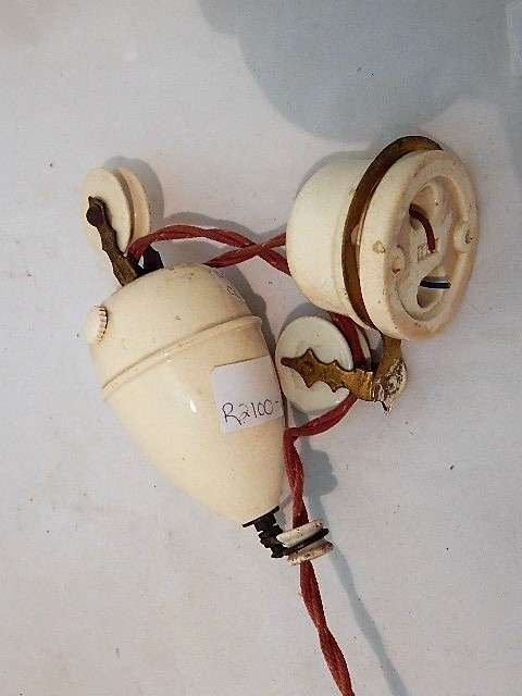 A VICTORIAN RISE AND FALL LAMP WITH A PINK GLASS SHADE