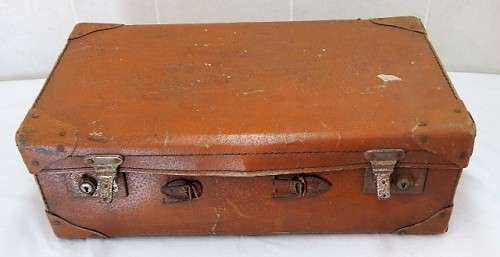 A VINTAGE VULCANESS FIBER SUITCASE