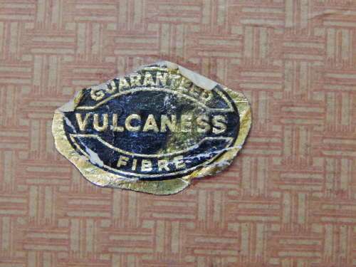 A VINTAGE VULCANESS FIBER SUITCASE