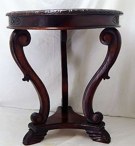 A BEAUTIFUL ROUND SIDE TABLE