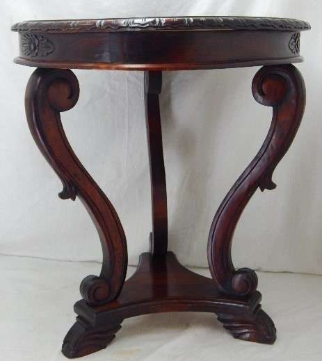 A BEAUTIFUL ROUND SIDE TABLE