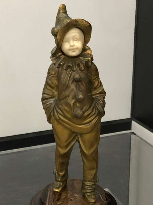 FRENCH BRONZE AND IVORY FIGURE ON MARBLE BASE OF A BOY BY GEORGES OMERTH 1895-1914