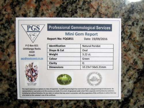 Certified Apple Green Peridot - SI, 3.12 ct. - Oval Faceted