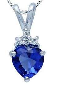 **** STUNNING DARK BLUE HEART SHAPED CUBIC ZIRCONIA SET IN .925 STERLING SILVER