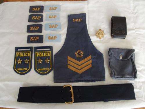 A Selection of Old SAP Badges and Insignia