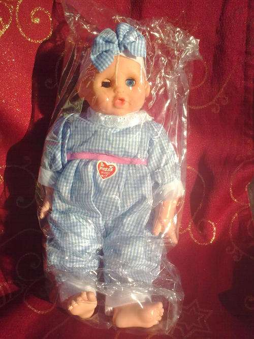 STUNNING BABY DOLL, PRESS HER TUMMY. ONLY 1 AVAILABLE
