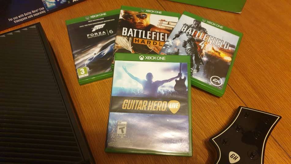 Xbox One 500GB Console Including 4 games and 2 Guitar Hero Live Controllers