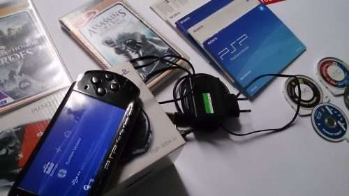 SONY PSP MODEL 3004, PLUS GAMES IN ORIGINAL BOX