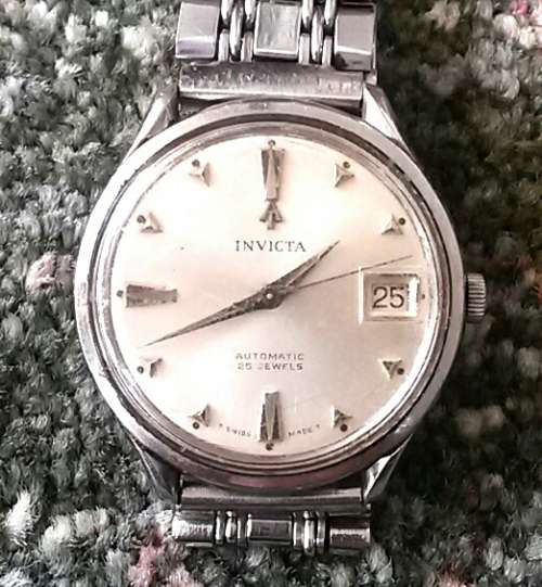 Rare and collectible vintage Swiss made Invicta men's automatic watch with 25 rubies. 1960's